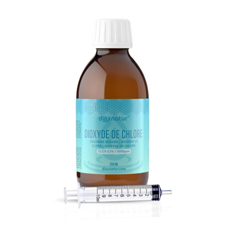 DIOXNATUR® Dioxyde de chlore 3000 ppm CDS 250 ml. Seringue de 10 ml incluse. Étiquette FR. Bouteille en verre ambré avec compte-